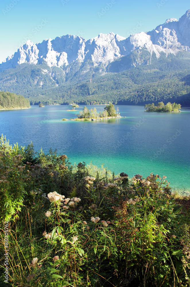 Beautiful mountain lake. View of Lake Eibsee and Zugspitze in german Alps.