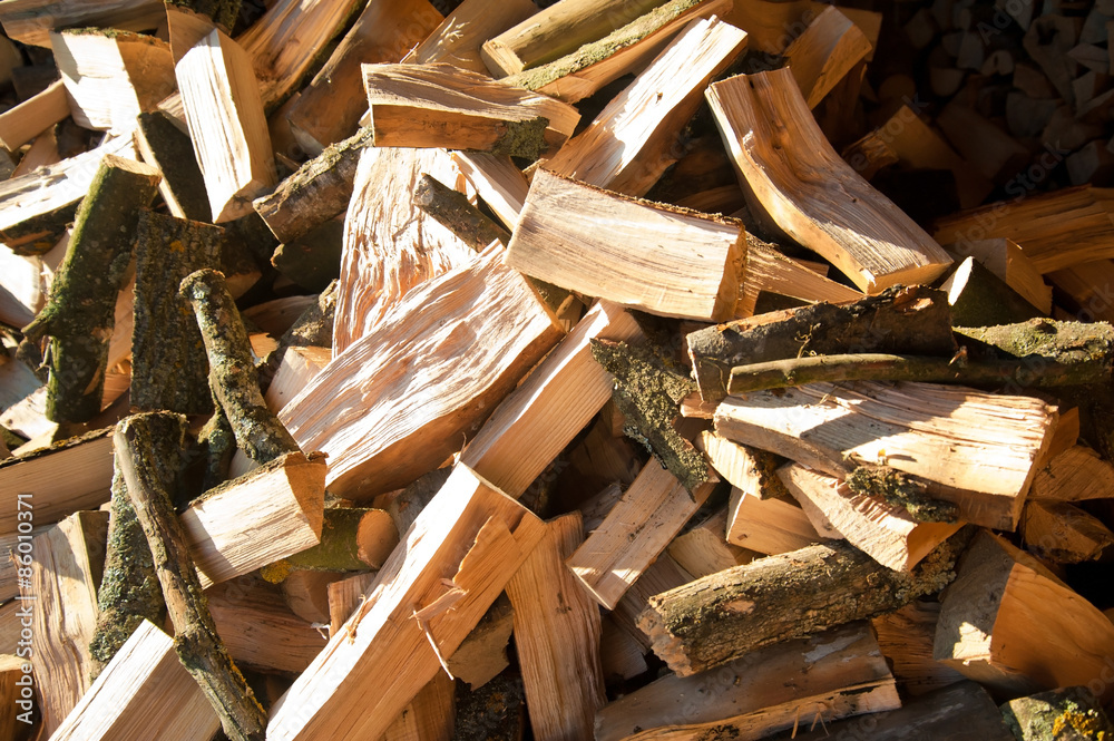 firewood background - chopped firewood on a stack firewood background - chopped firewood on a stack
