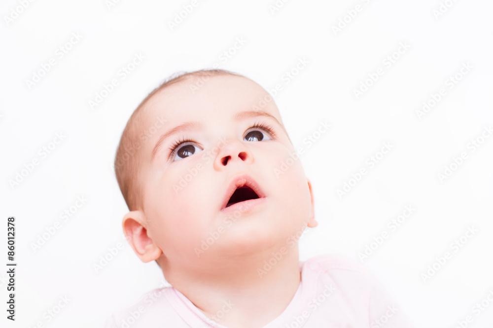 Close-up portrait of a beautiful baby on white background Close-up portrait of a beautiful baby on white background