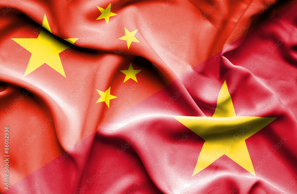 Waving flag of Vietnam and China Waving flag of Vietnam and China