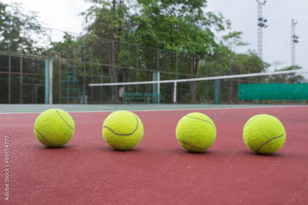Close up view of tennis balls on the tennis court