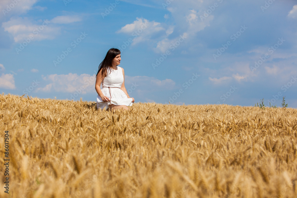 Beautiful girl on a golden field of wheat enjoy life Beautiful girl on a golden field of wheat enjoy life