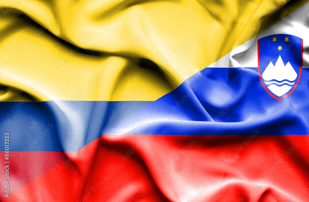 Waving flag of Slovenia and Columbia