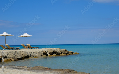 Crystalline Mediterranean Sea on a white sand beach photo