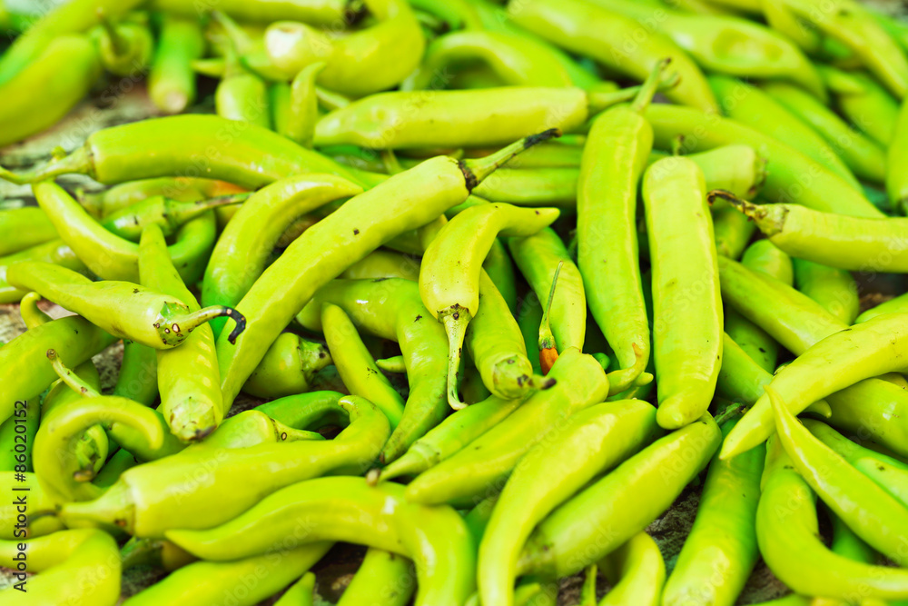 Fresh Green Hot Chillies in Marketplace for Background Uses.