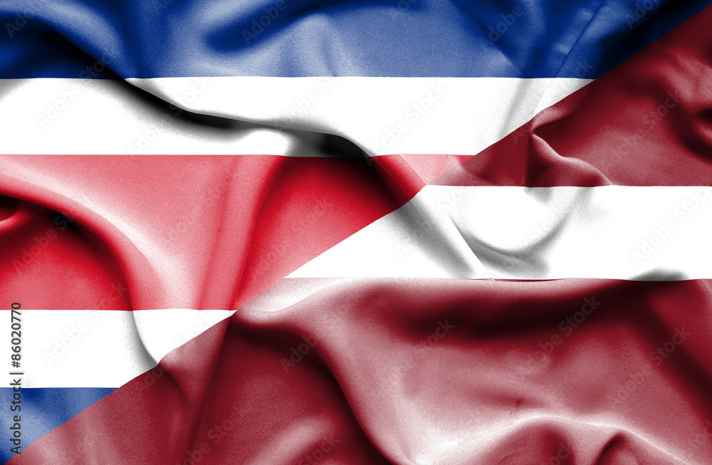 Waving flag of Latvia and Costa Rica