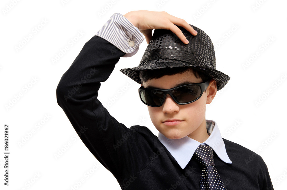 Boy with carnival costume. Teenager in carnival costume, wearing hat and black sunglasses as a detective. Image isolated on white. Boy with carnival costume. Teenager in carnival costume, wearing hat and black sunglasses as a detective. Image isolated on white.