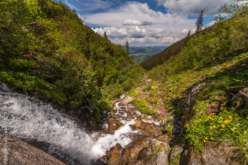 Beautiful small waterfall In Mountains, Ukraine.