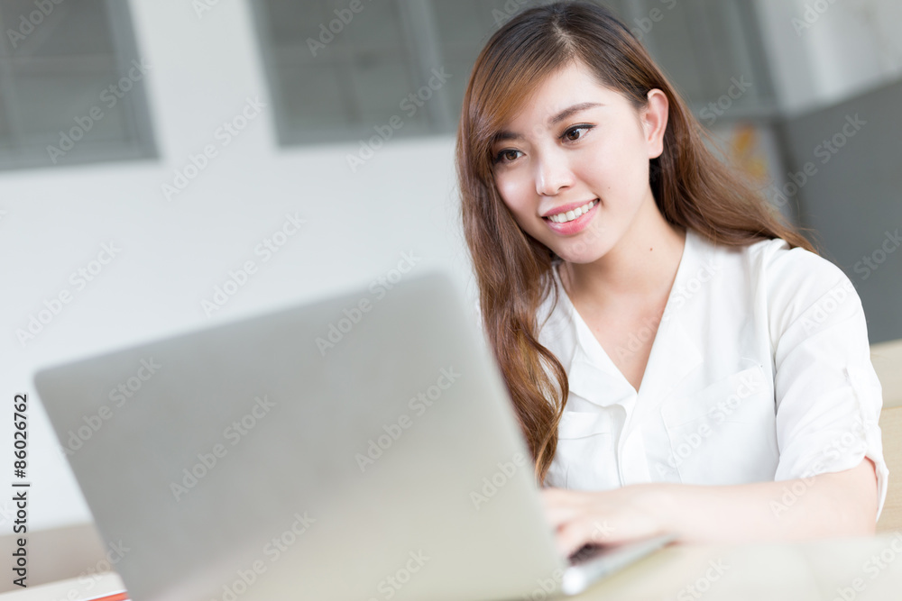 Asian beautiful female student study with laptop in classroom Asian beautiful female student study with laptop in classroom