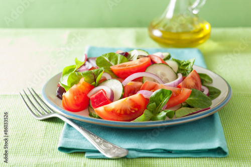 healthy tomato salad with onion cucumber pepper