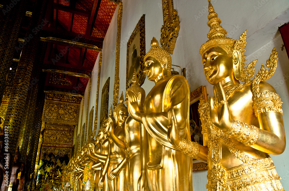 Fototapeta premium Golden buddha statue in buddhism temple thailand 