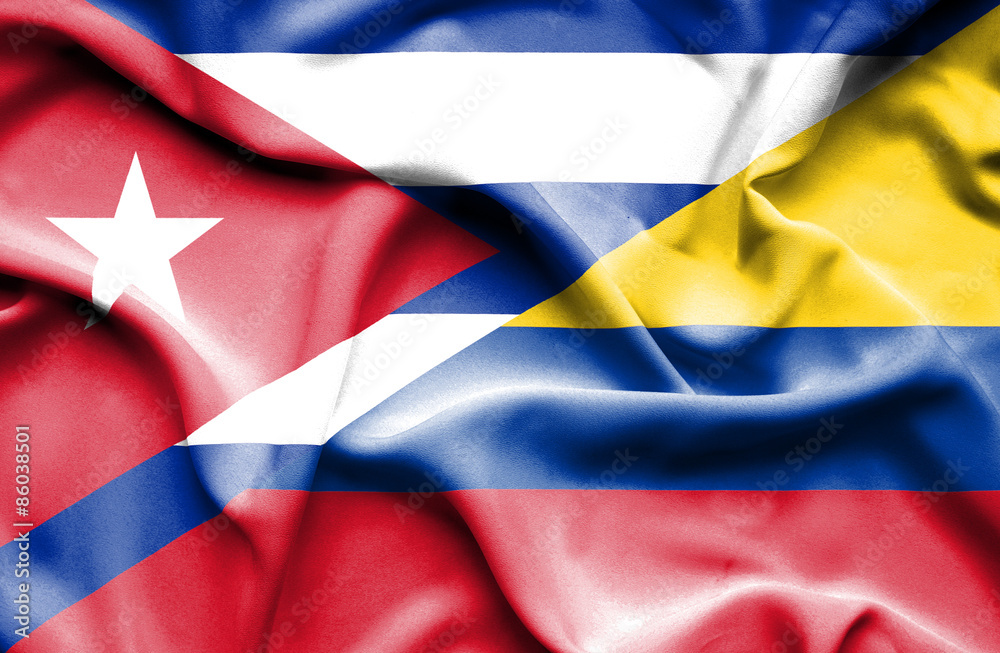 Naklejka premium Waving flag of Columbia and Cuba