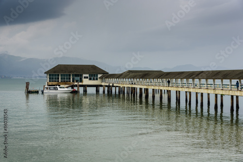 ranong pier light house and cumulonimbus © NuttKomo