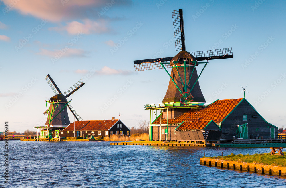 Authentic Zaandam mills on the water channel in Zaanstad willage