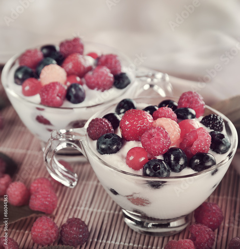 Two Cups Of Yogurt With Berries