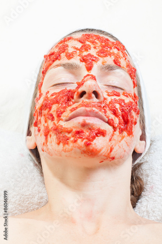 Fototapeta Naklejka Na Ścianę i Meble -  hygienic cleansing mask on her face