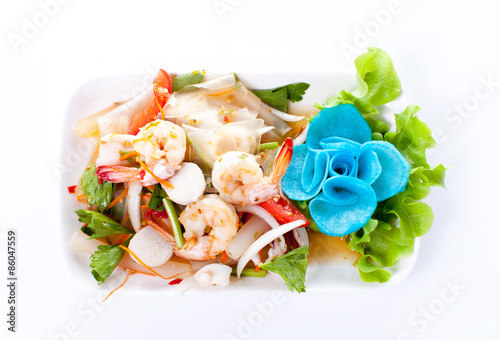 Thai spicy salad with shrimp and mix vegetable on white background