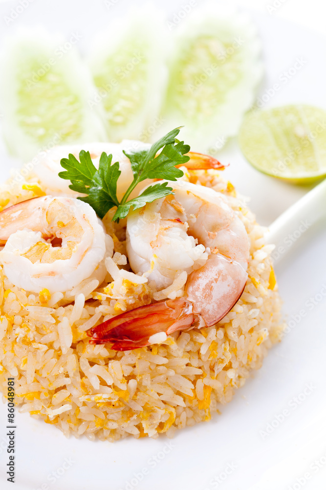 Fried rice with shrimp and vegetables on white plate, Thai cuisine