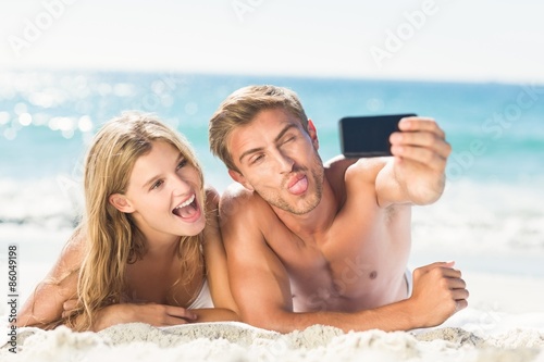 Happy couple taking selfie © WavebreakMediaMicro
