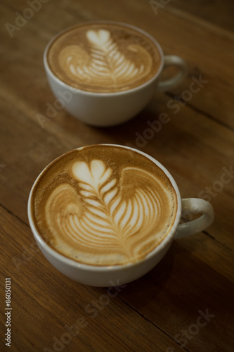 coffee latte art in cofeee sbop vintage color tone