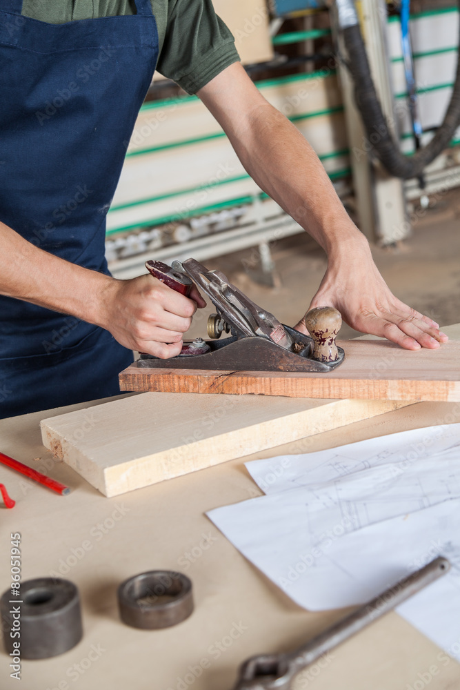 Man working with wood Man working with wood