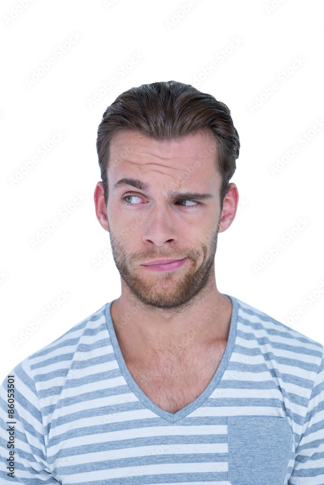 Handsome casual man grimacing in front of camera Handsome casual man grimacing in front of camera