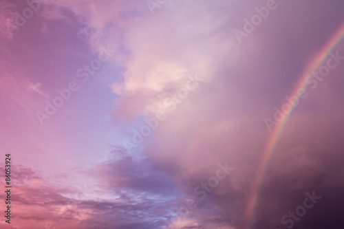 rainbow with cloudy on sky,purple color filter effect © pingpao