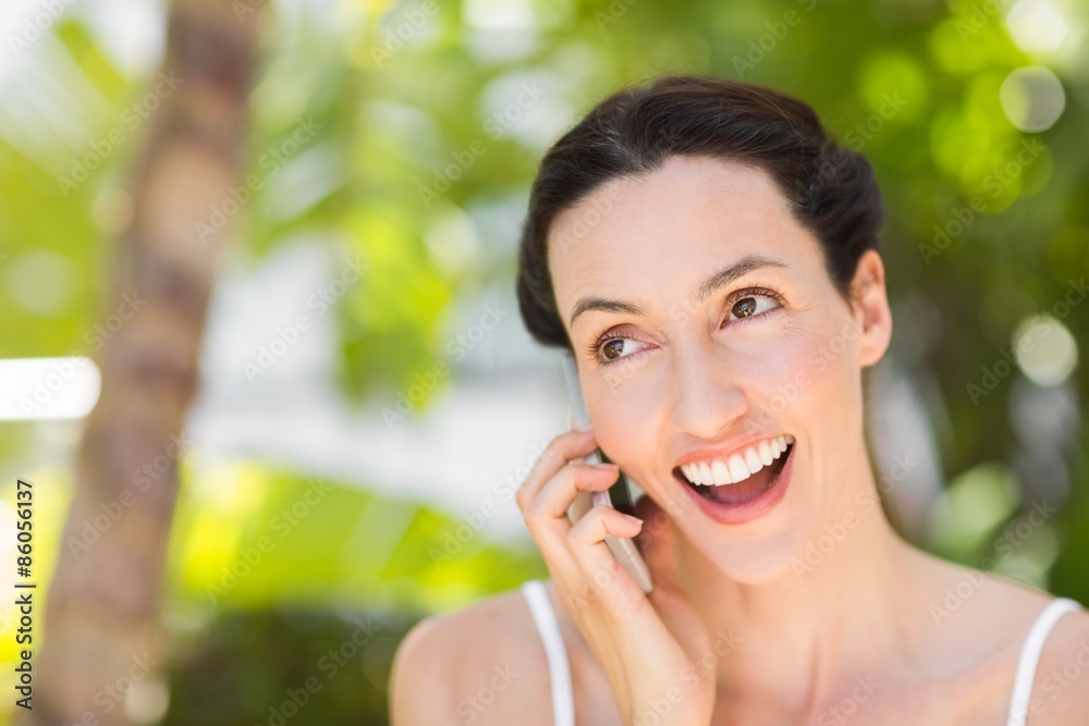 woman in white using her phone woman in white using her phone