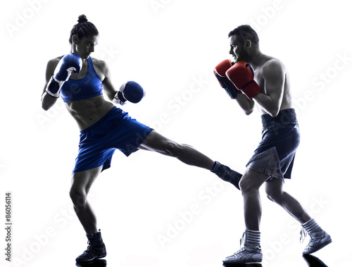 woman boxer boxing man kickboxing silhouette isolated © snaptitude
