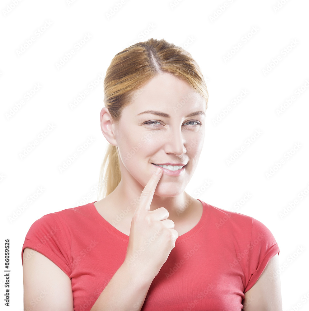 Blonde holding a finger to her mouth. Blonde holding a finger to her mouth.