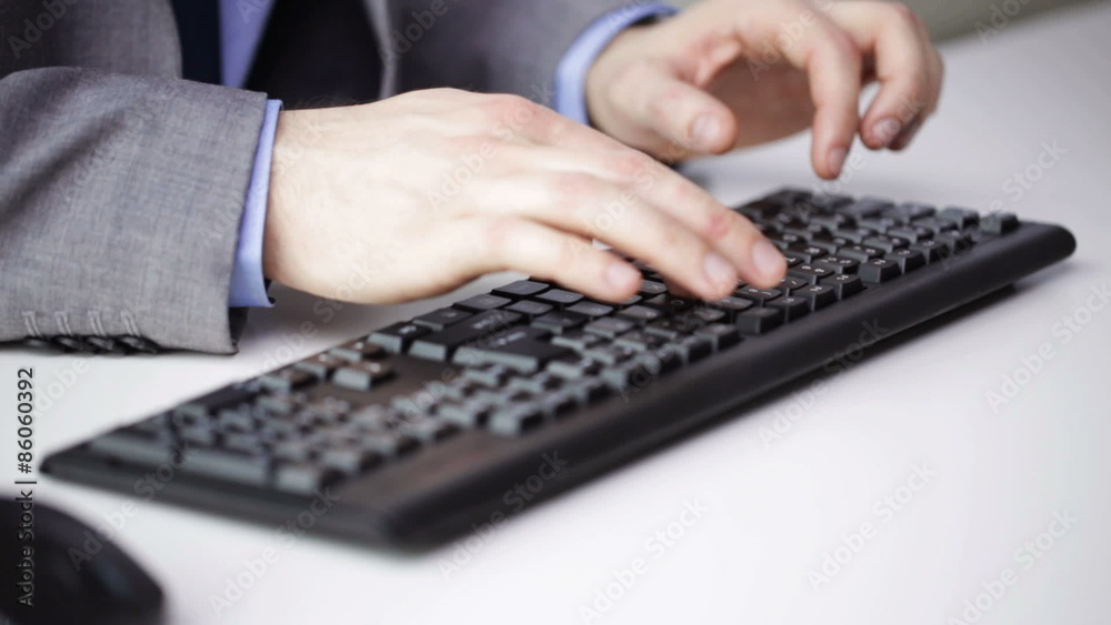 close up of businessman hands typing on keyboard close up of businessman hands typing on keyboard