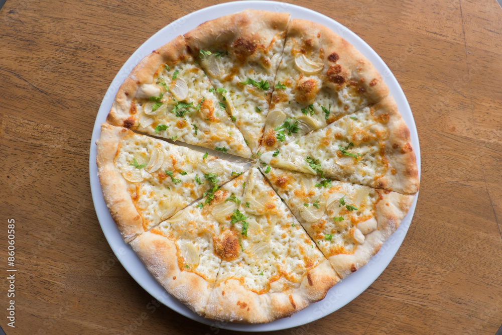 White Pizza , garlic and Mozzarella Cheese White Pizza , garlic and Mozzarella Cheese
