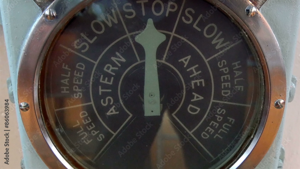A use lamp pattern machine found in the warship of Belfast. It has stop go and other words inside the glass A use lamp pattern machine found in the warship of Belfast. It has stop go and other words inside the glass