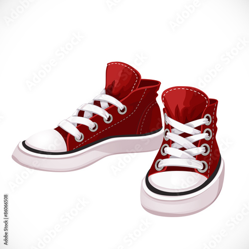Red sports sneakers with white laces isolated on white background