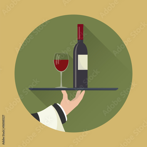 Waiter with wine bottle and wine glass