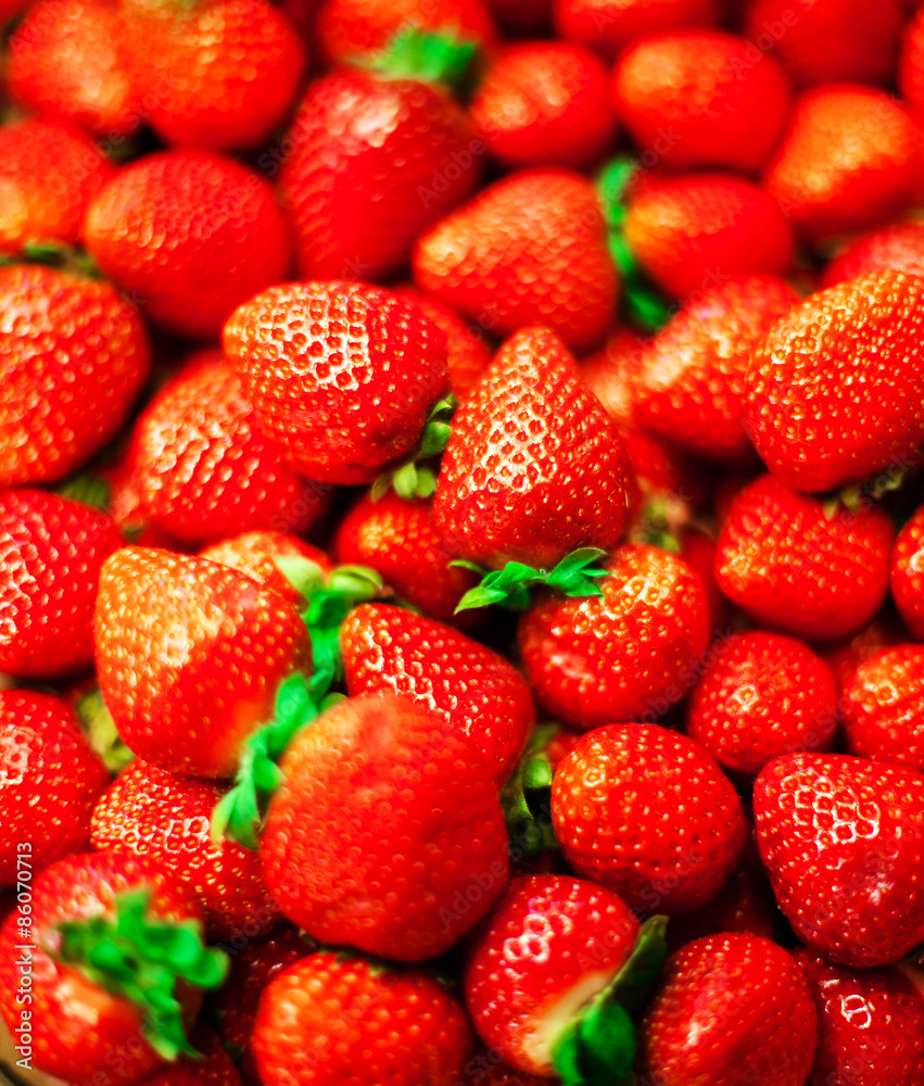 Strawberry background on a market stall close-up. Food healthy Strawberry background on a market stall close-up. Food healthy