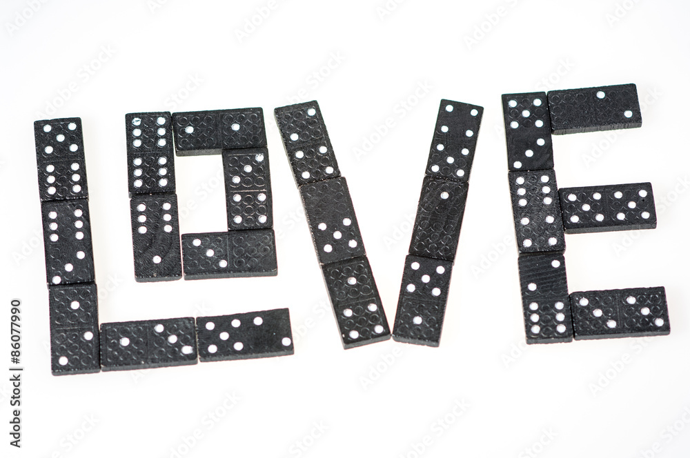 Word love made of wooden dominoes