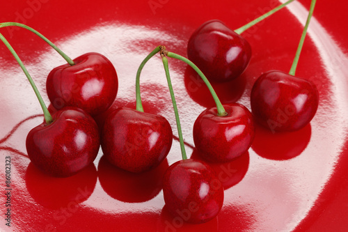 Cherry on a Red Dish