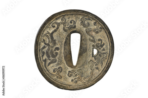 Japanese sword mountings on white background (Tsuba) photo