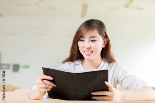 Asian beautiful female student study portrait in classroom