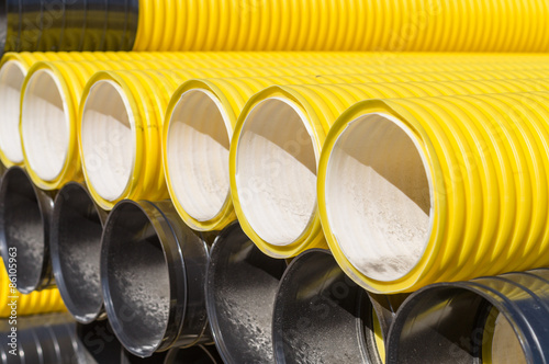 Stack of corrugated plastic pipes