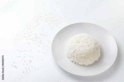 Rice on white plate isolated on white background