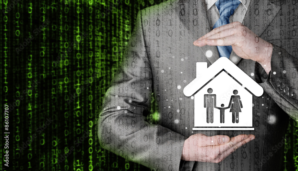 businessman protecting family in home with hands businessman protecting family in home with hands