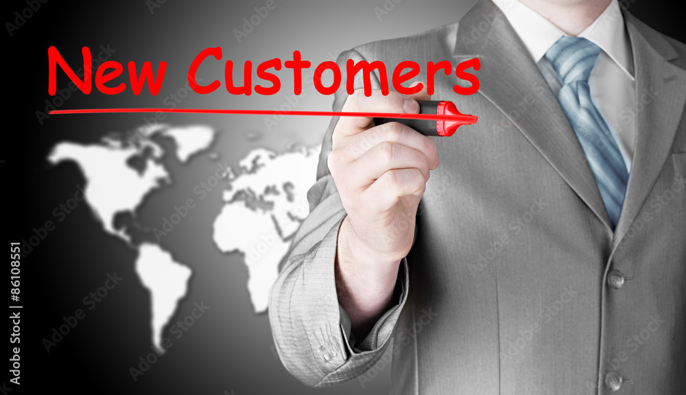 businessman writing new customers businessman writing new customers
