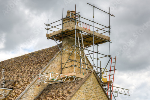 Scafolding around a residential house chimney