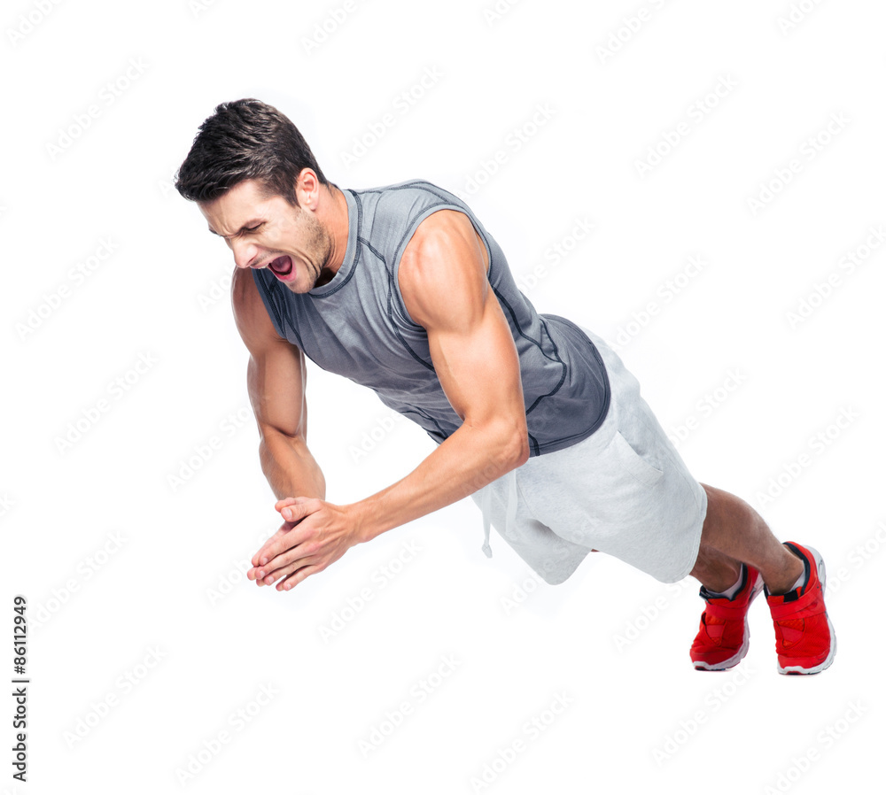 Fitness man doing exercises on the floor Fitness man doing exercises on the floor