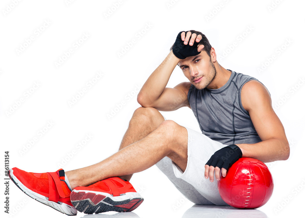Fitness man resting on the floor