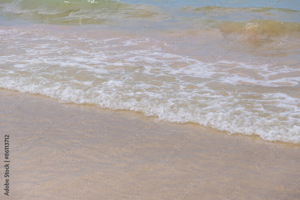 wave of sea on the sandy beach
