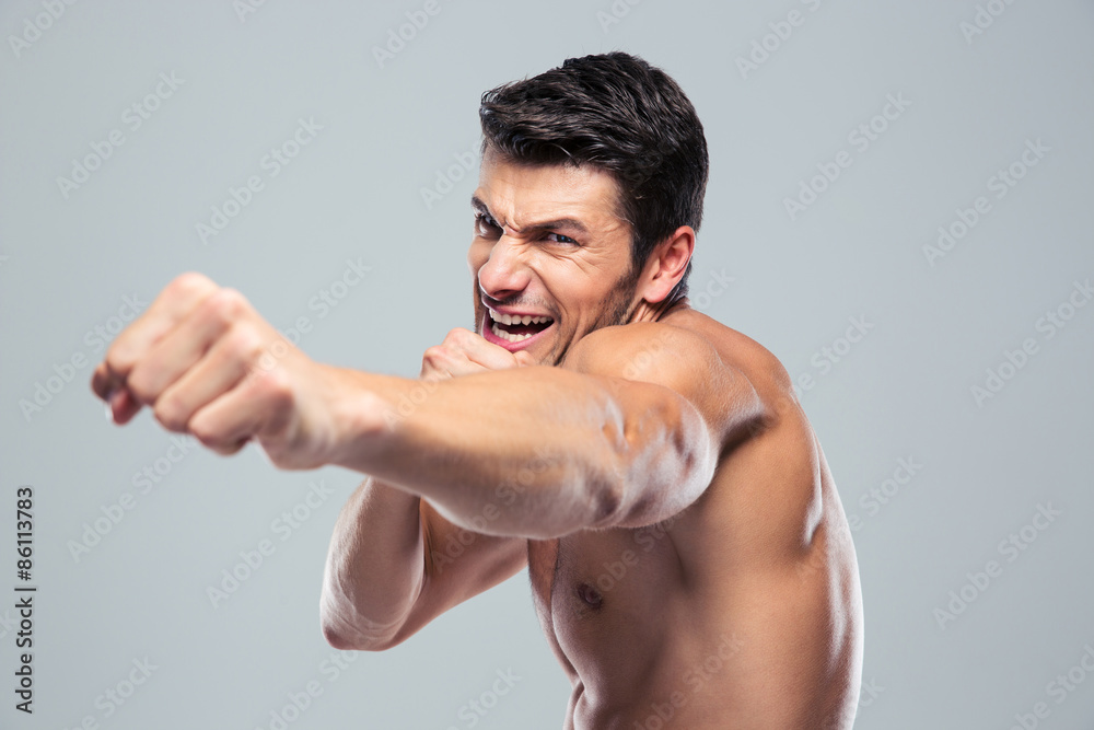 Muscular man boxing Muscular man boxing