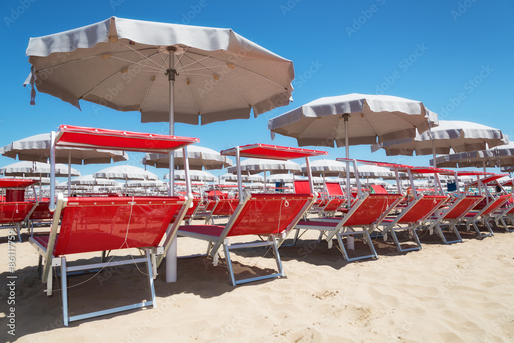 Umbrellas and sunbeds in Rimini and Riccione and Cattolica Beach, Italy